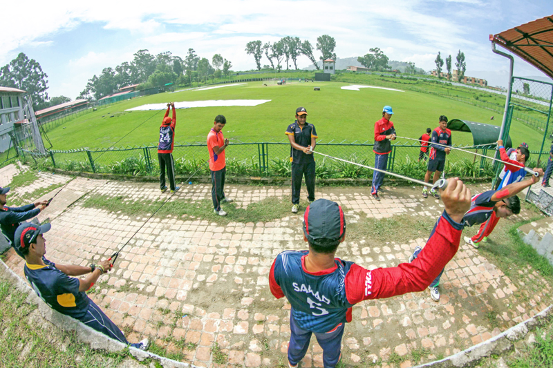 Nepal national cricket team members training at the TU Stadium in Kathmandu on Monday, August 1, 2016. Nepal are preparing for the ICC World Cricket League Championship matches against the Netherlands slated for August 13 and 15 in Amstelveen.