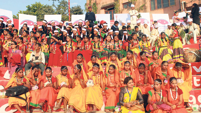 Children in different traditional dress,